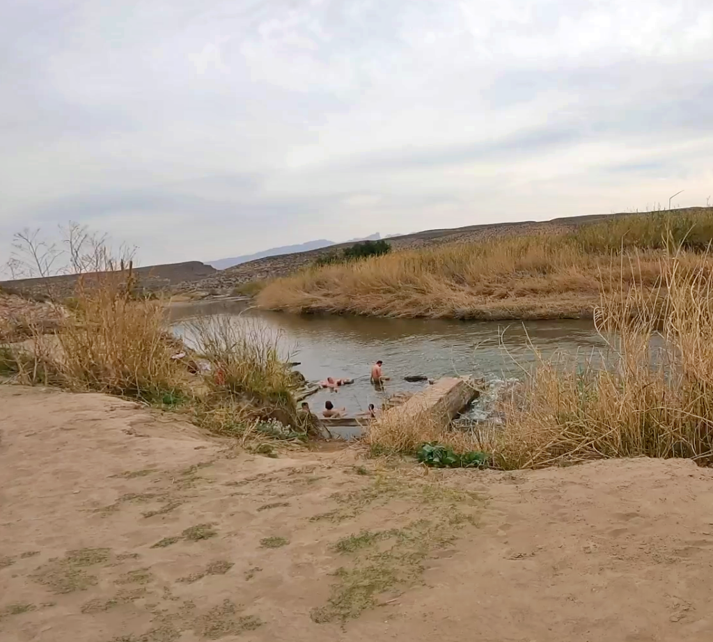 Visitors soak in the historic hot springs along the Rio Grande in Big Bend National Park