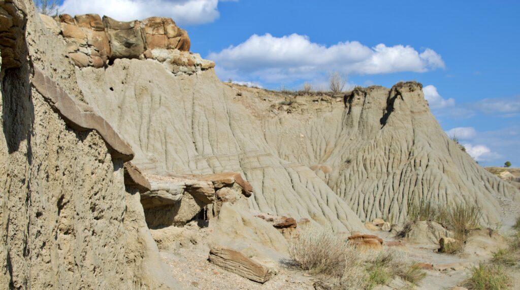 Eroded sandstone walls and caprock formations near the Cannonball Concretions in Theodore Roosevelt National Park's North Unit